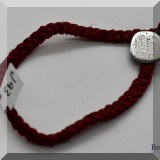 J093. Jeanine Payer red leather braided bracelet with journey quote. 8” - $85 